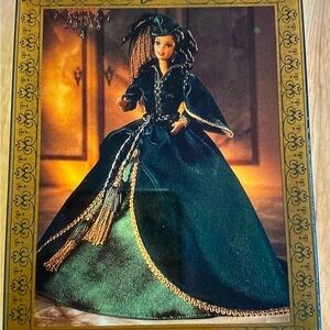 Elegant Green Doll with Gold Accents Music Box